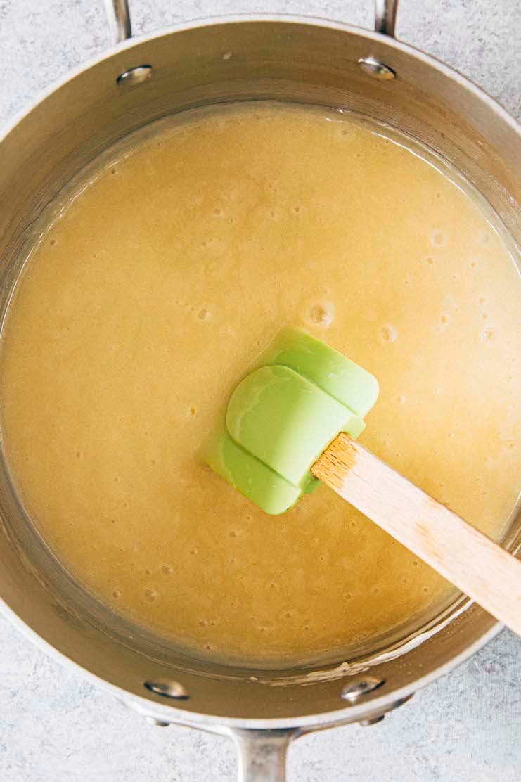 photo showing the cake batter in the pan after the wet ingredients have mixed in