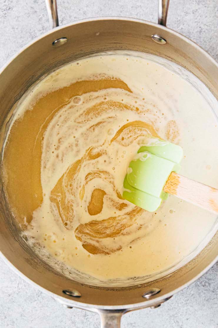 photo showing the cake batter in the pan after the wet ingredients have been added