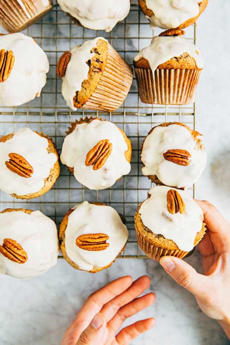 hands reaching for maple pecan muffins