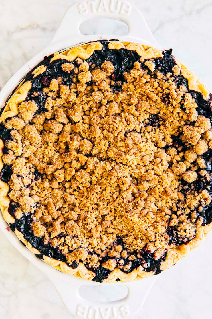 close up of blueberry crumble pie