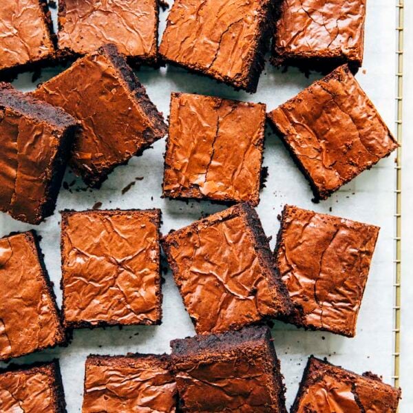 A photo of brownies on a wire rack.