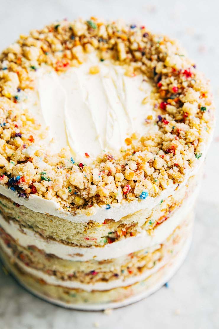 photo of milk bar birthday cake close up with lots of birthday cake crumbs