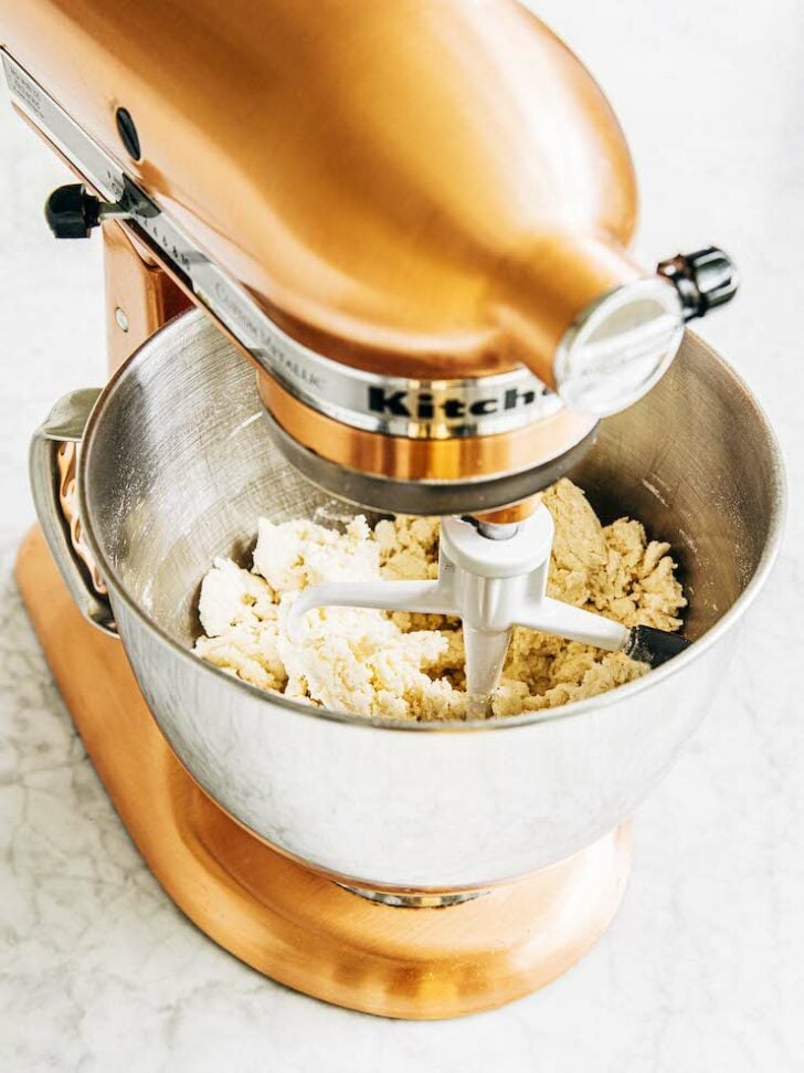 photo of clumping stage in stand mixer pie dough recipe