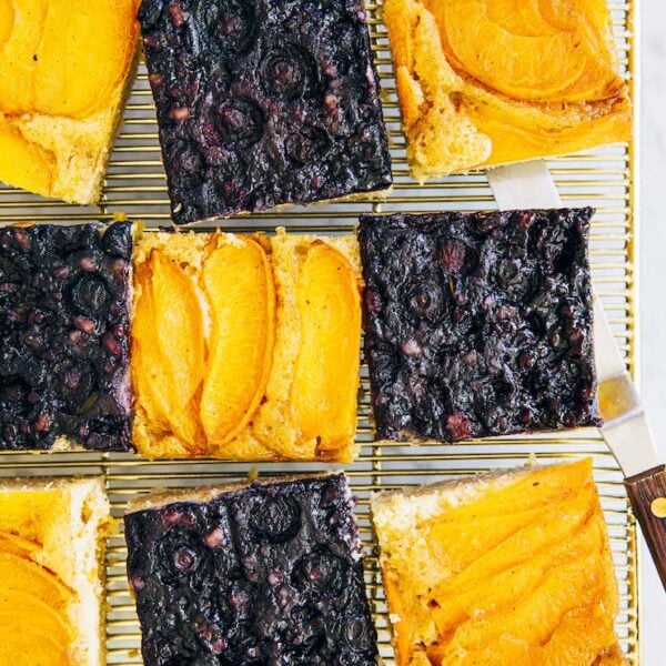 slices of upside down cake on a gold wire rack