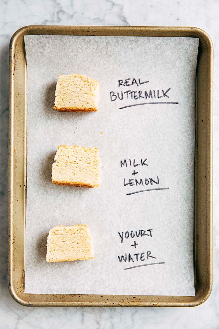 photo of buttermilk biscuits sliced on a tray made with different buttermilk substitutes