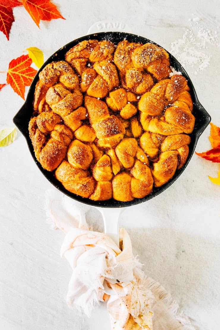 photo of pumpkin pull apart knots in cast iron pan on white backdrop