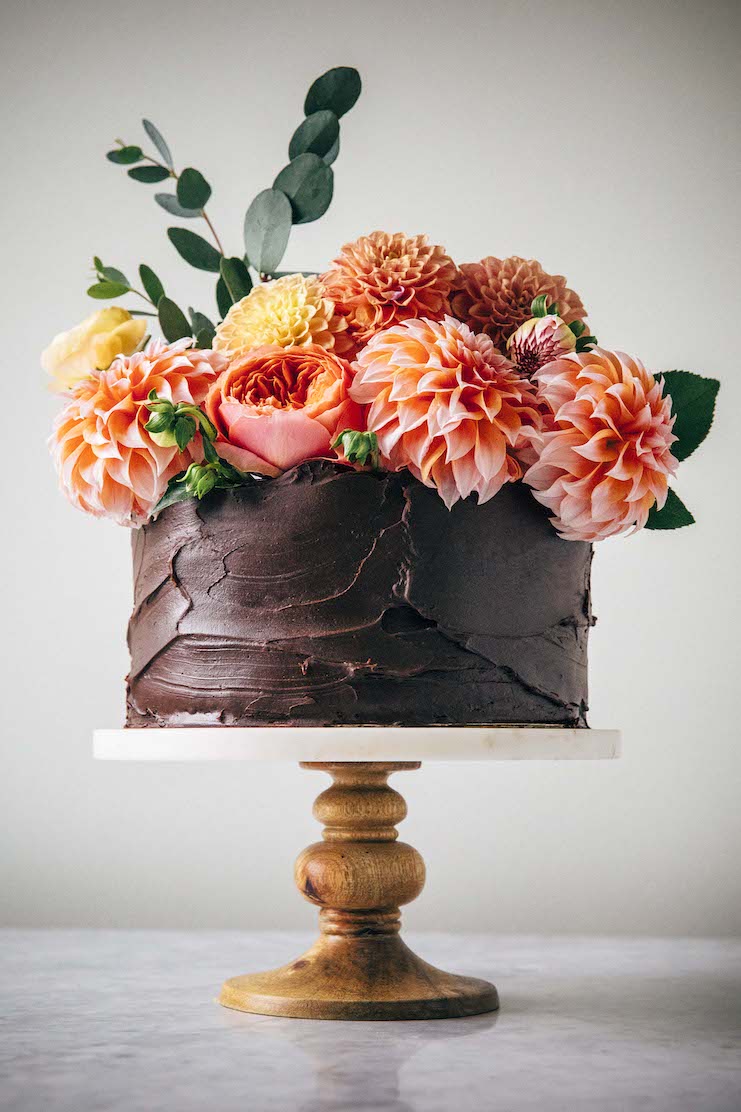 photo of chocolate wedding cake with flowers