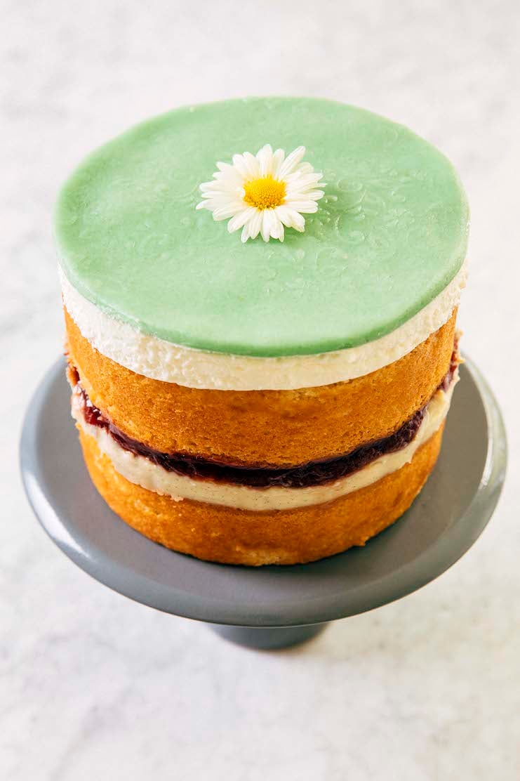 photo of swedish princess layer cake on gray cake stand