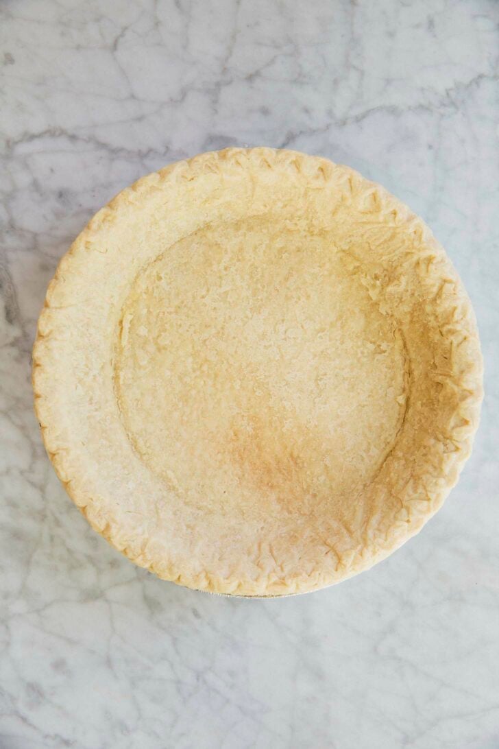 photo showing the pie crust after it has been pre baked for 30 minutes