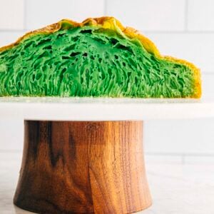 photo of vietnamese honeycomb cake sliced on a cake stand