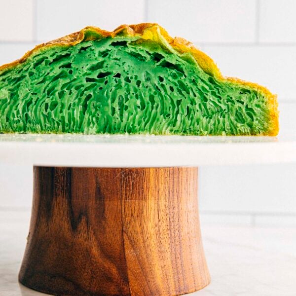 photo of vietnamese honeycomb cake sliced on a cake stand