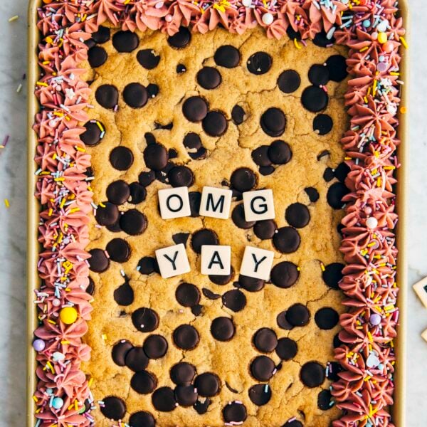 photo of rectangular cookie cake frosted and decorated with "OMG YAY"