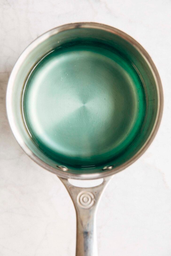Photo of Mountain Dew Baja Blast in a light colored sauce pan