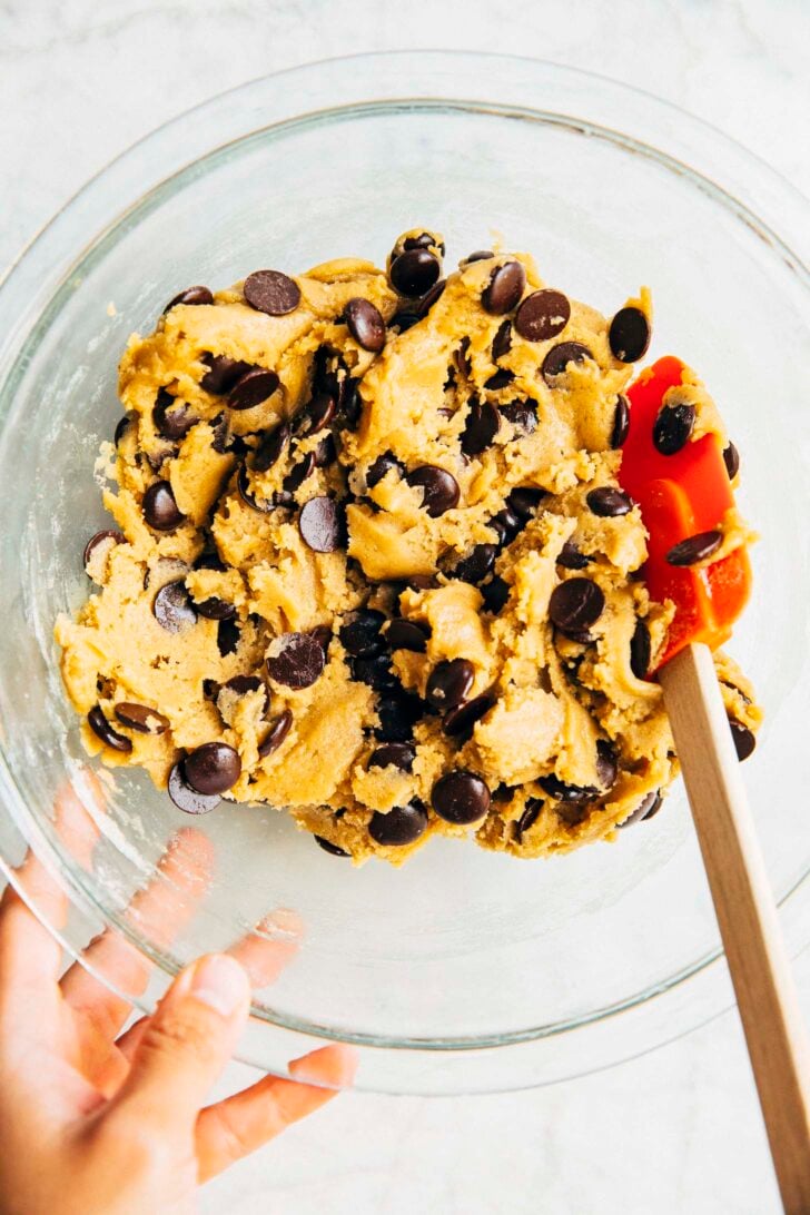 photo of the cookie dough for the cookie cake in a bowl
