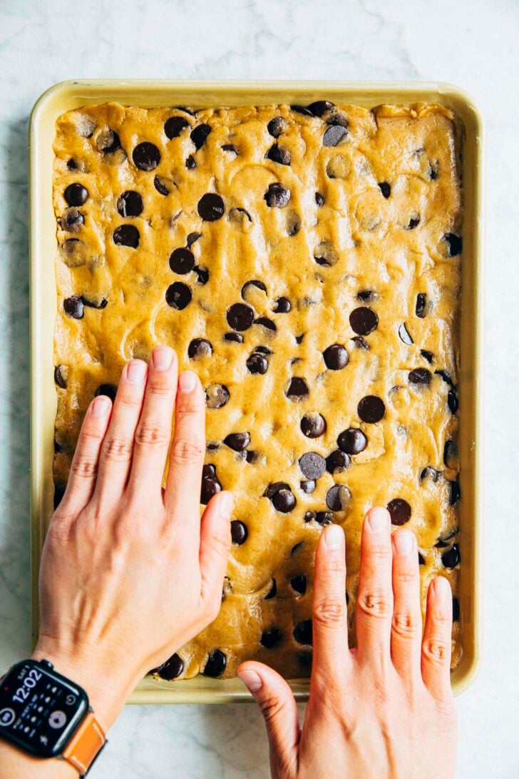 photo of michelle from hummingbird high showing the cookie dough in the sheet pan ready for baking