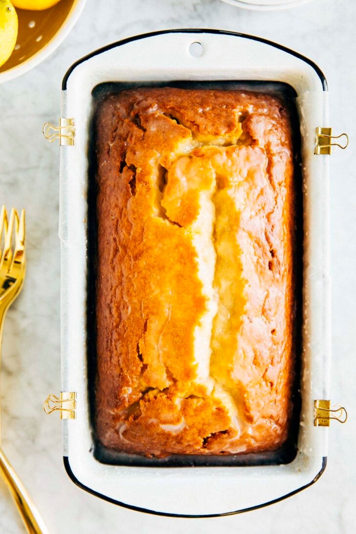 photo showing the lemon yogurt loaf unsliced in the loaf pan