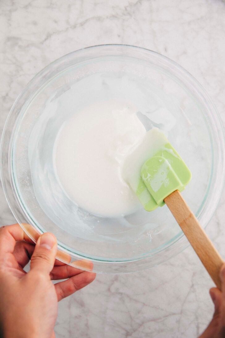 Photo showing lemon glaze in a clear bowl