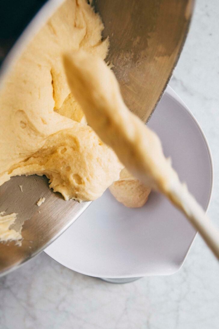 photo of Michelle separating some of the condensed milk batter into a new bowl to make the coffee batter