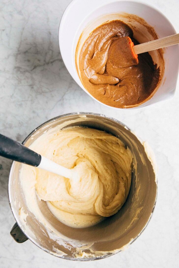 photo of condensed milk batter and coffee batter in two separate bowls for the vietnamese coffee bundt cake