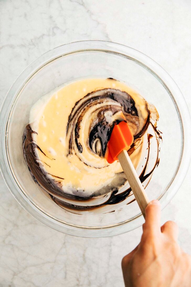 photo of michelle mixing chocolate into the batter to make the chocolate swirl for the loaf