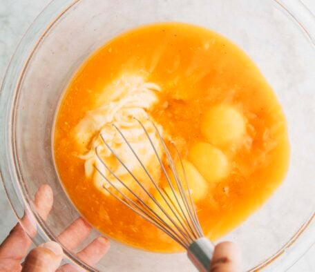 photo of Michelle from Hummingbird High whisking the ingredients for thai tea pie filling