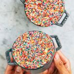 photo of two dot cakes in gray mini cast iron pans