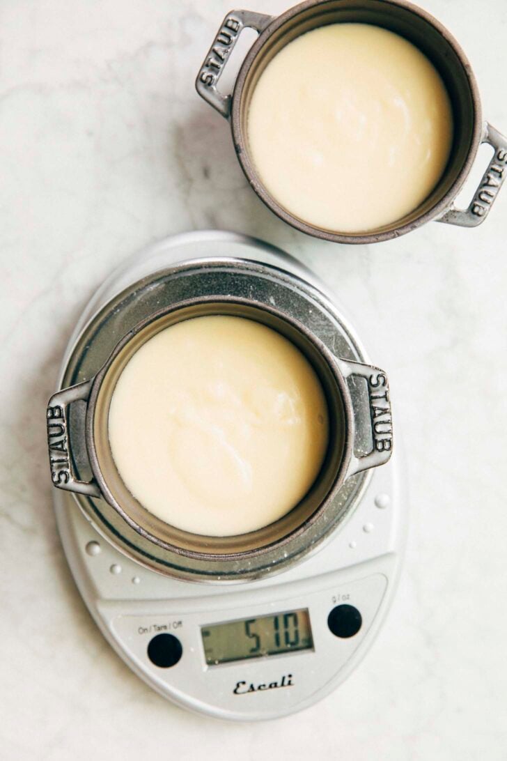 photo of michelle from hummingbird high dividing the dot cake batter into two cake pans