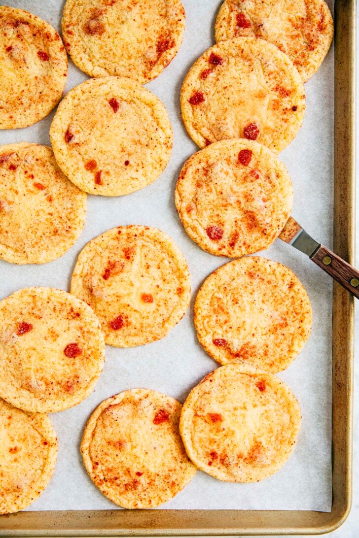 photo showing strawberry doodle cookies on sheet pan